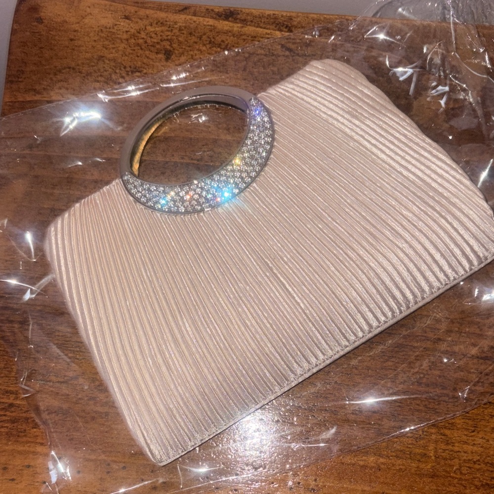 Elegant Cream Clutch with Silver Accents